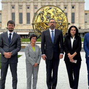 Panelists participating in a CSI-hosted UN Human Rights Council side event stand before the Palais des Nations in Geneva on 29 September 2026. Left to right: CSI Director for Public Advocacy Dr. Joel Veldkamp, European Free Alliance President Lorena Lopez de Lacalle, lawyer Karnig Kerkonian, Former Deputy Foreign Minister of the Republic of Artsakh Armine Aleksanyan, and Thibault van den Bossche of the European Center for Law and Justice. Credit: CSI